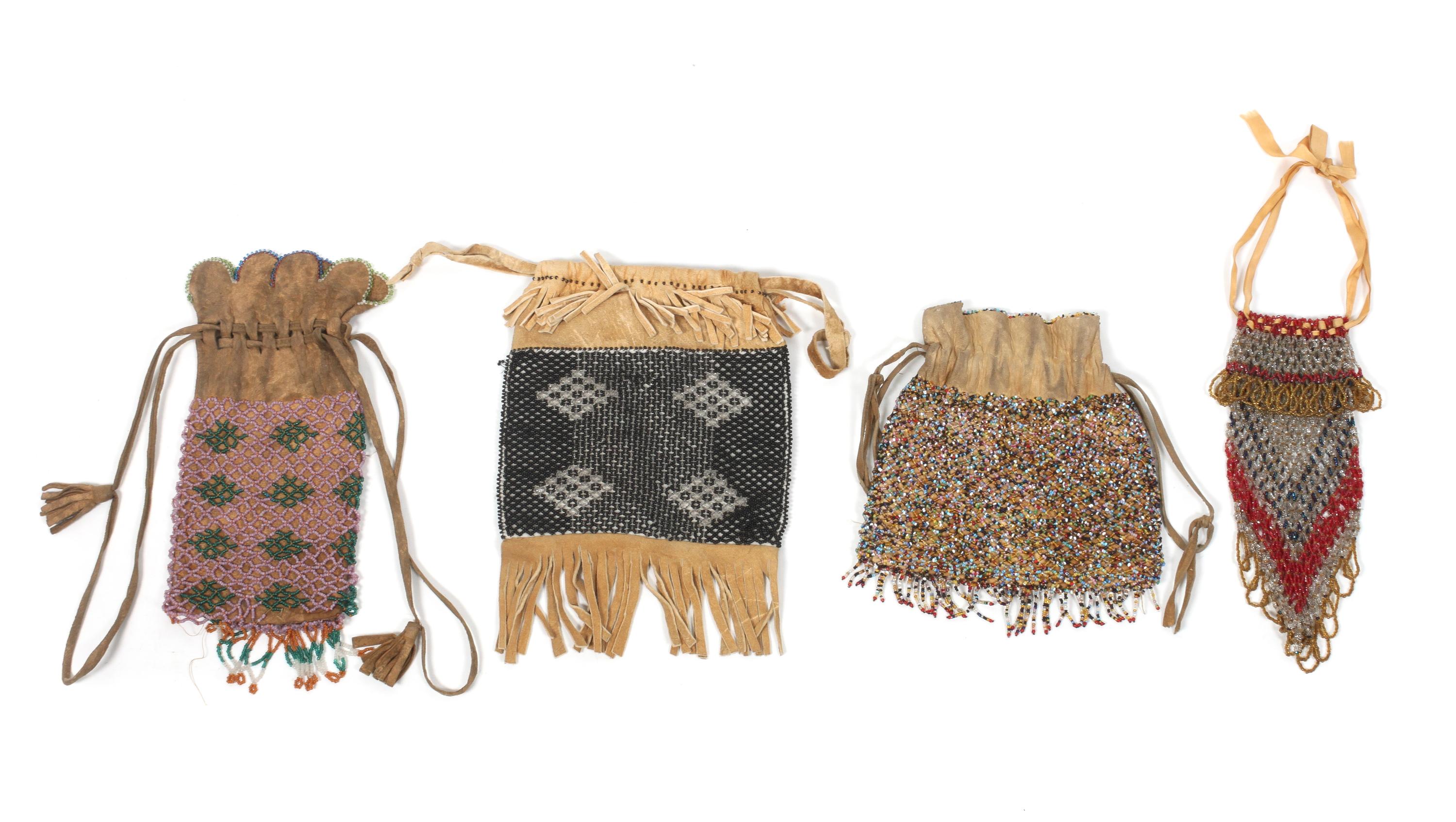 Four Southwestern Beaded Pouches Height of largest 10 x 7 1/4 inches.