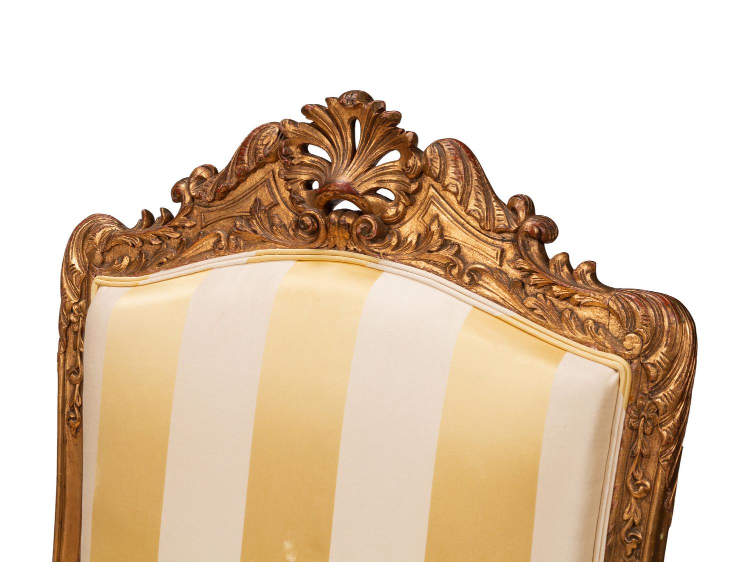 A Pair of Régence Style Giltwood Fauteuils