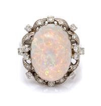 A Platinum, Opal and Diamond Ring, 7.40 dwts.