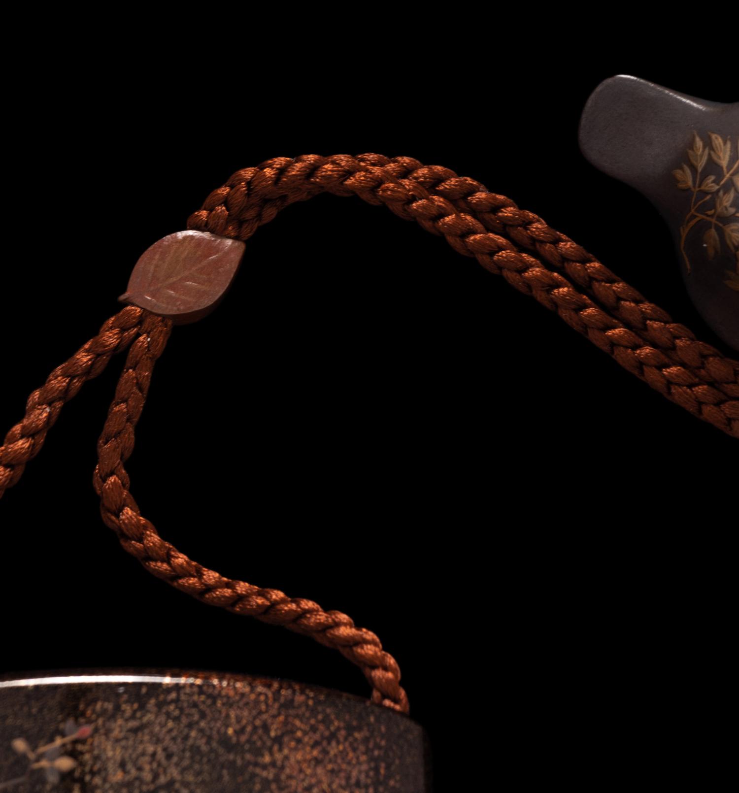 A Japanese Black and Gold Lacquer Four-Case Inro