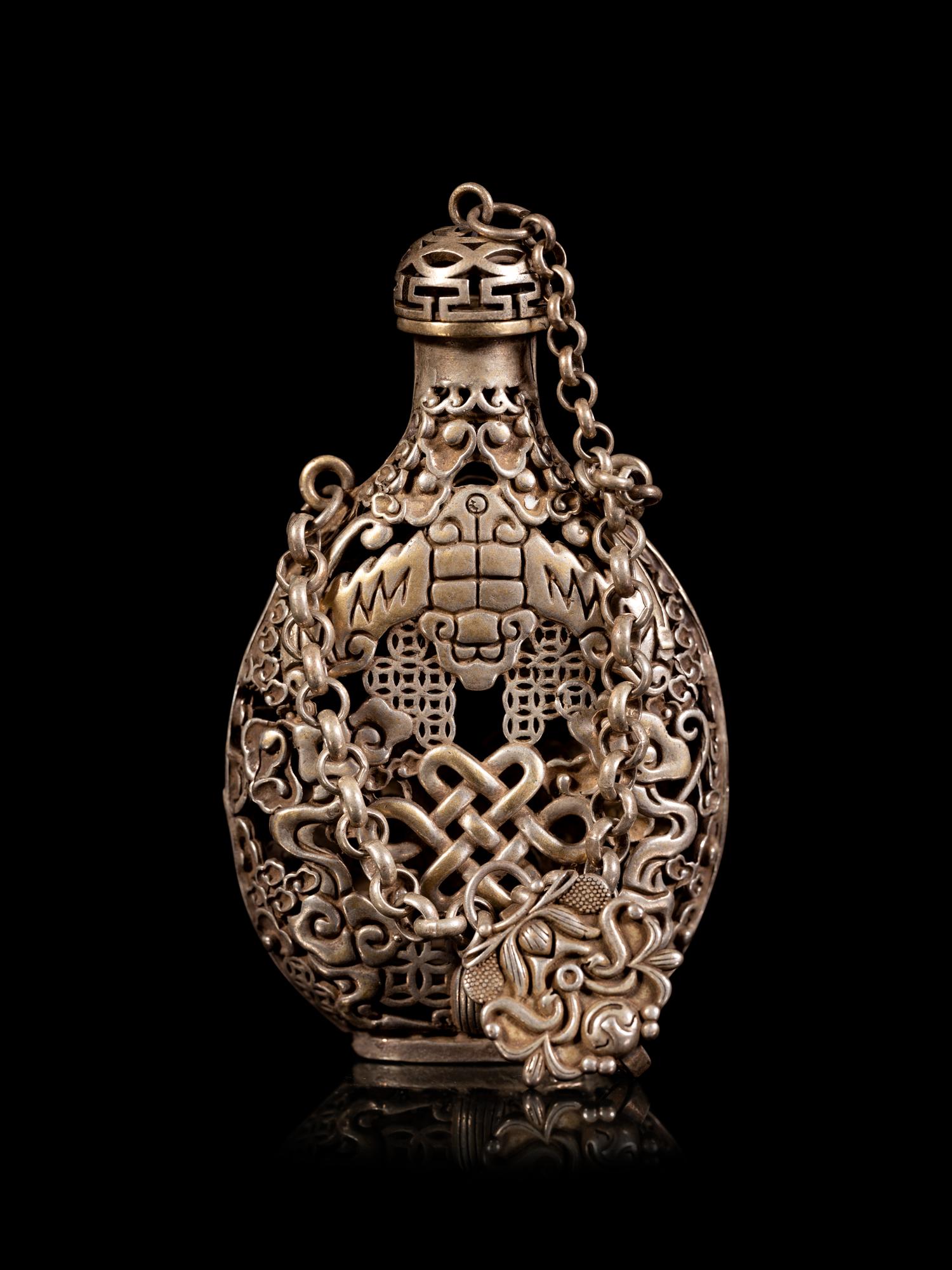 A Chinese Reticulated Silver Snuff Bottle
