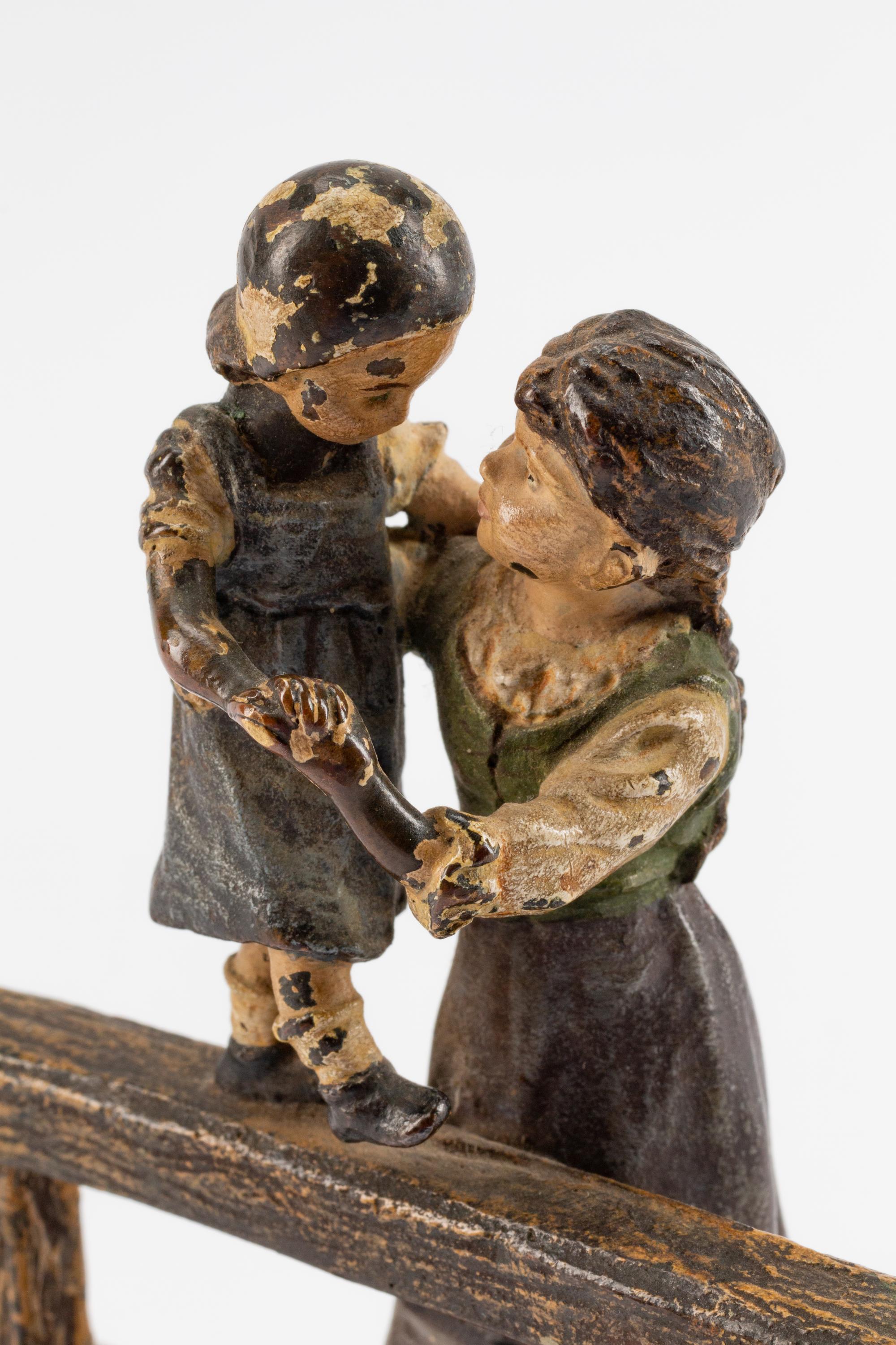 An Austrian Cold-Painted Bronze Figure of a Woman and a Girl — CIRCA 1900