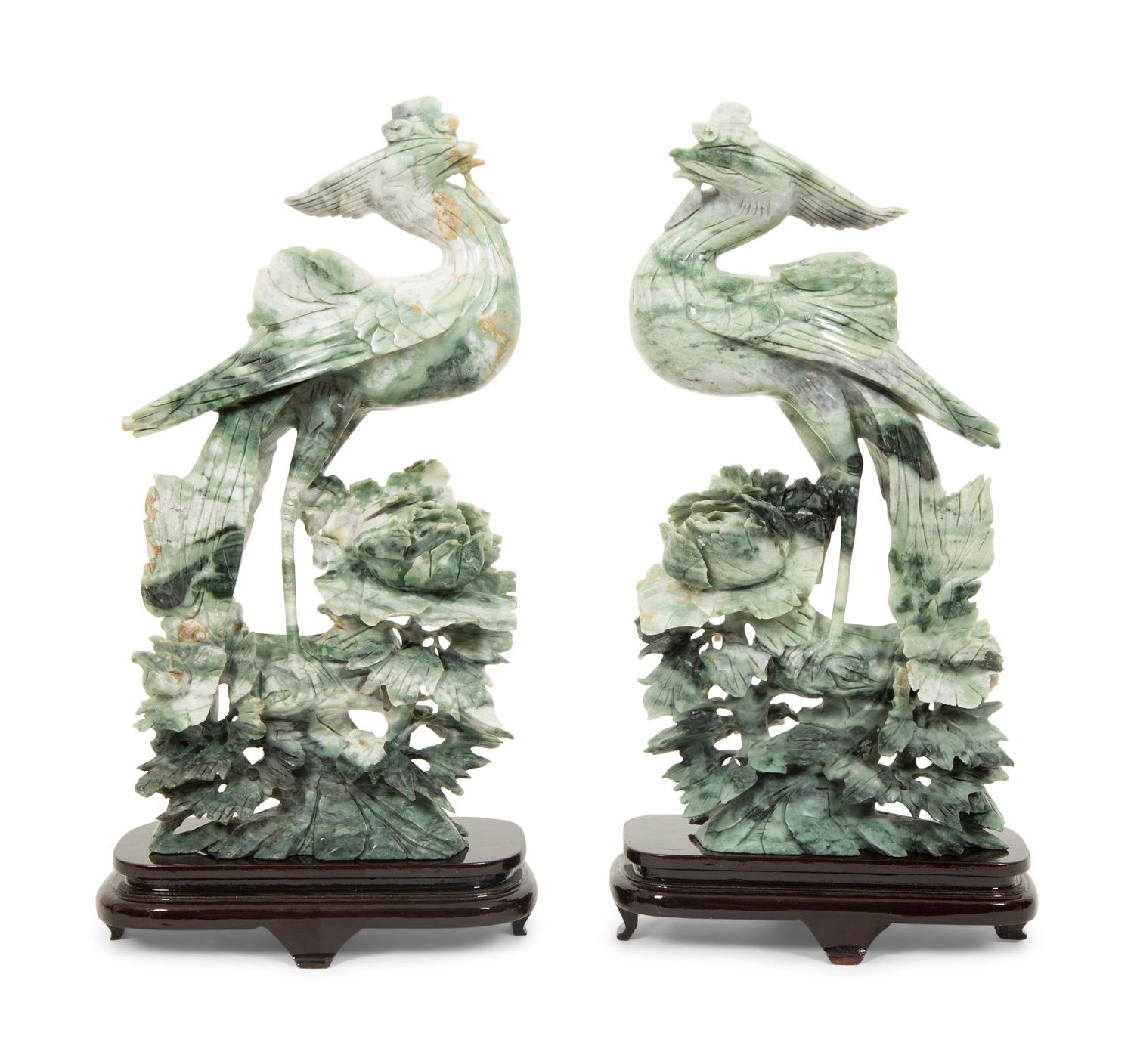 A Pair of Chinese Carved Jadeite Figures of Phoenixes