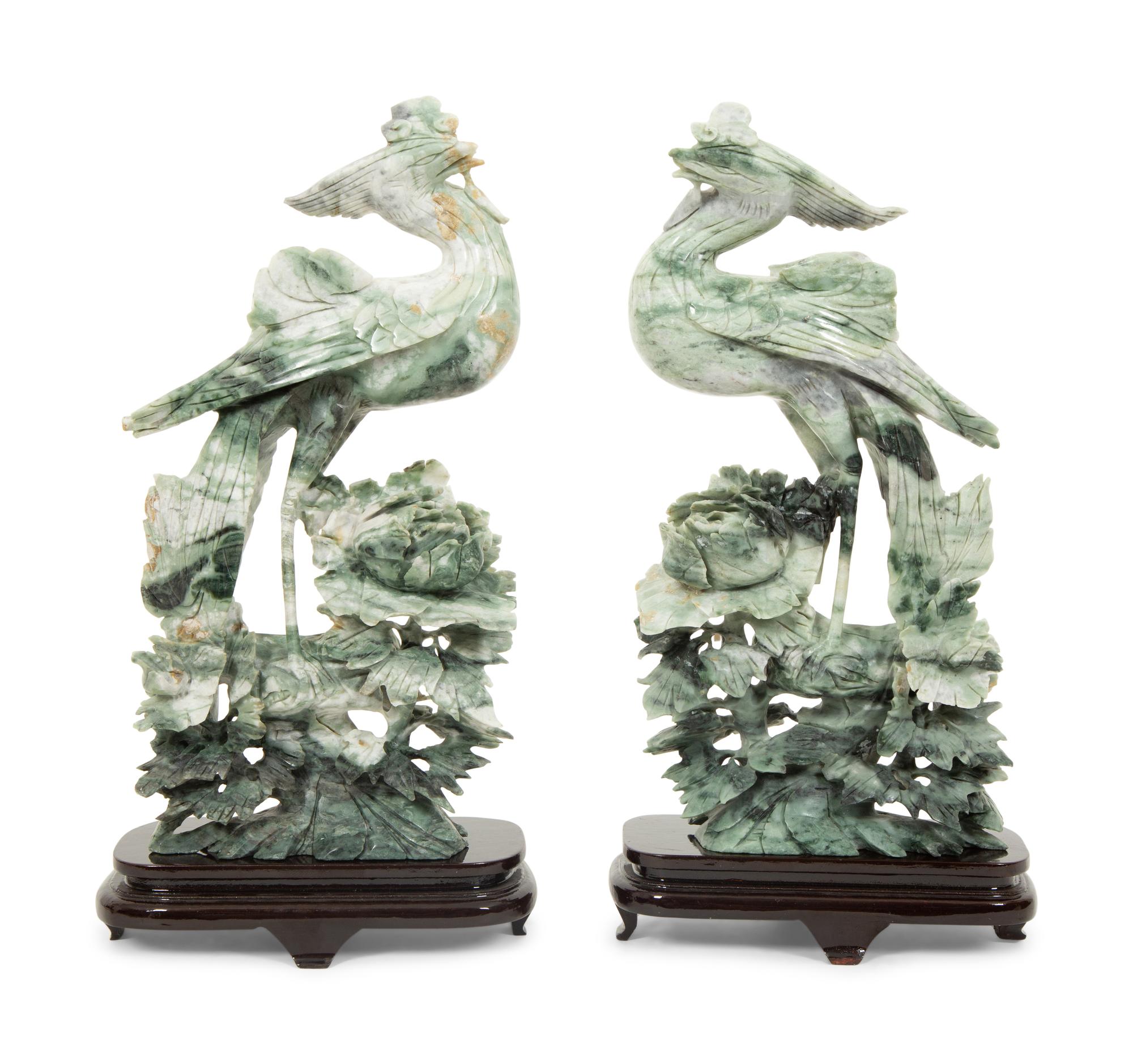 A Pair of Chinese Carved Jadeite Figures of Phoenixes