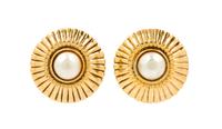 A Pair of Chanel Goldtone Earclips, 1.25" circumference.