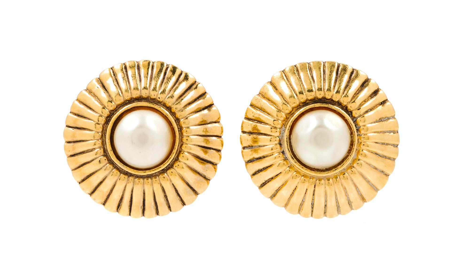 A Pair of Chanel Goldtone Earclips, 1.25" circumference.
