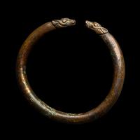 An Achaemenid or Lydian Bronze Bracelet with Calf-head Terminals