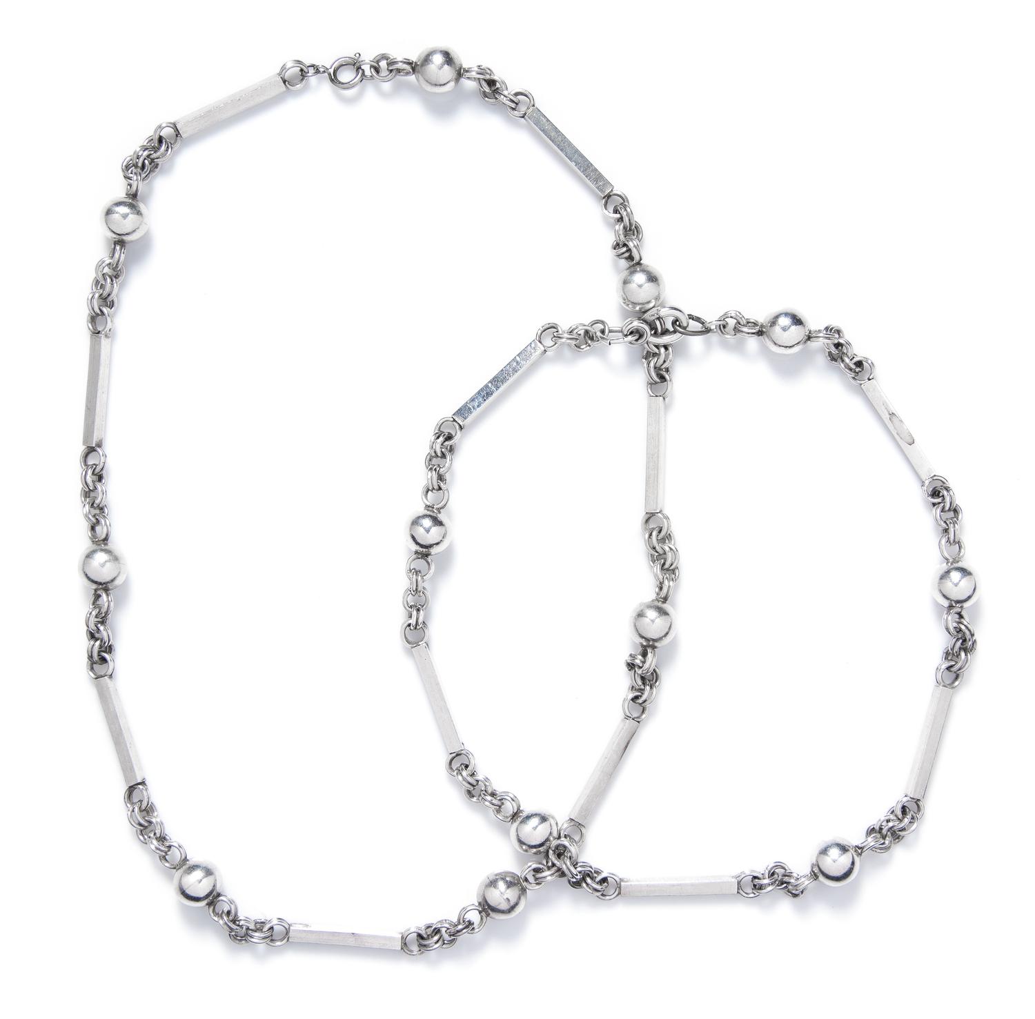 A Pair of Sterling Silver Necklaces, 84.90 dwts.