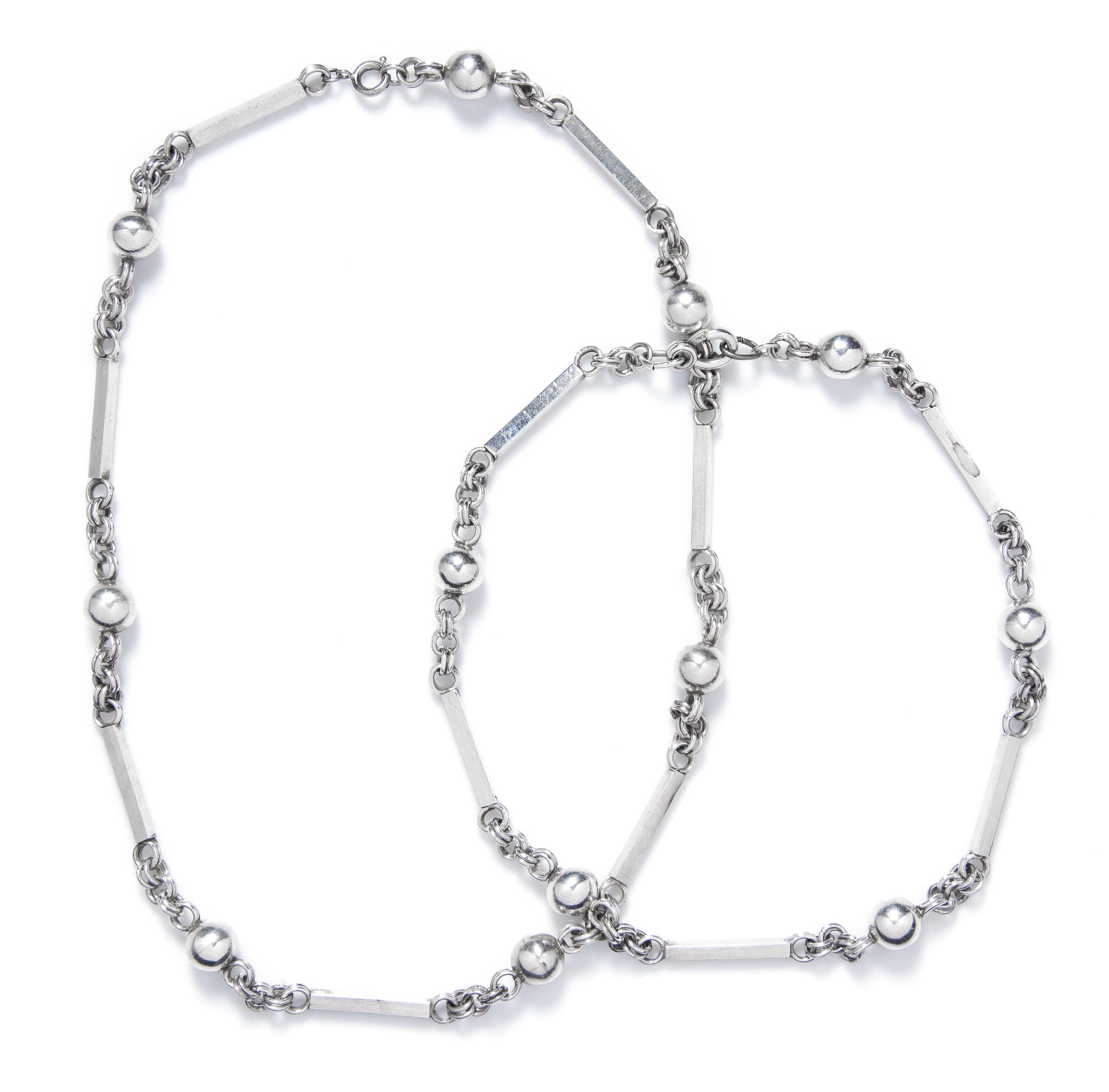 A Pair of Sterling Silver Necklaces, 84.90 dwts.