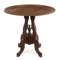 A Victorian Walnut Center Table Height 27 1/2 x width 31 x depth 24 inches. — LATE 19TH CENTURY