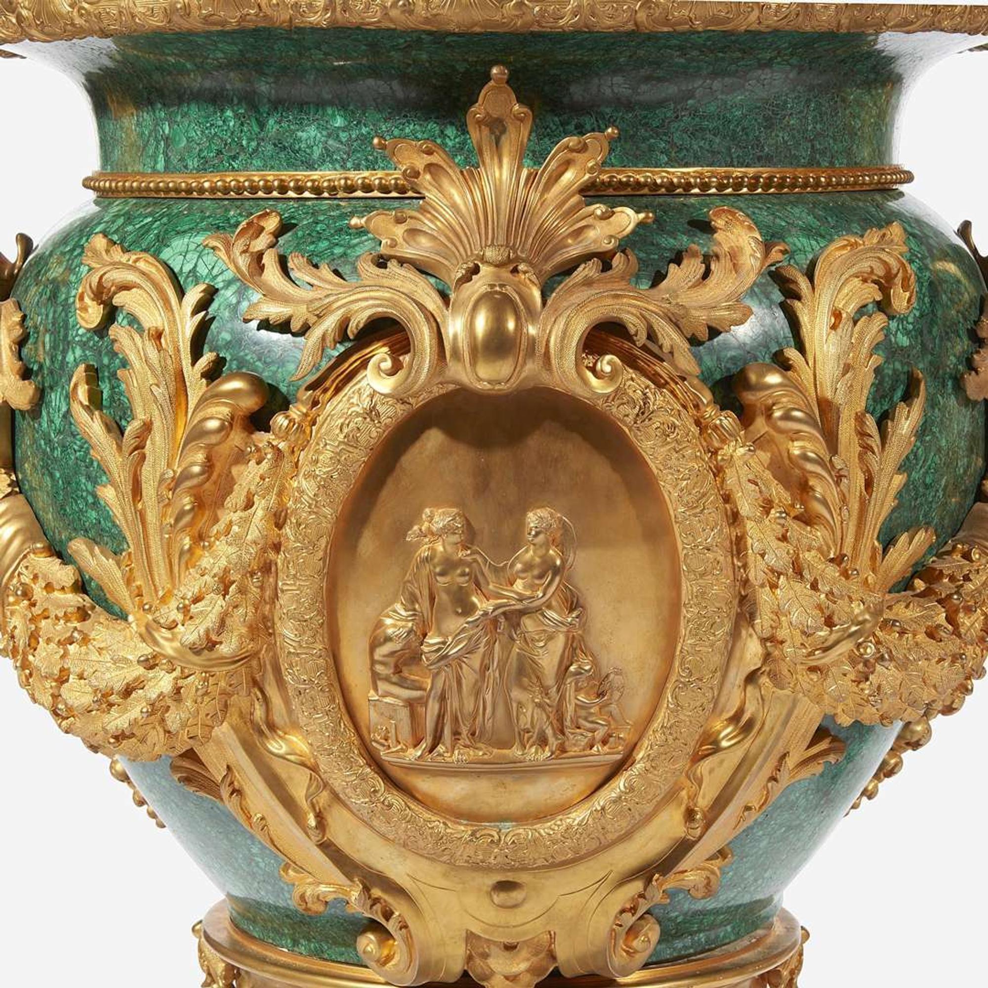 An Impressive Pair of Louis XVI Style Malachite and Gilt Bronze Urns 20th century