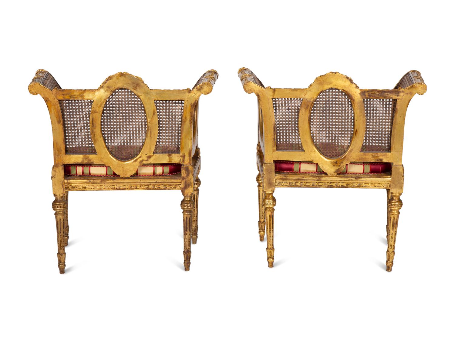 A Pair of Louis XVI Style Giltwood Cane-Back Benches