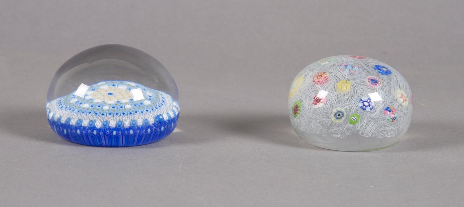 A Group of Two Baccarat Paperweights, Diameter of first 3 inches.