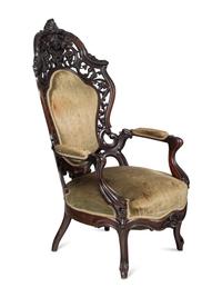A Renaissance Revival Rosewood Four-Piece Seating Suite