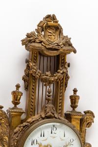 A Louis XVI Style Gilt Bronze Cartel Clock