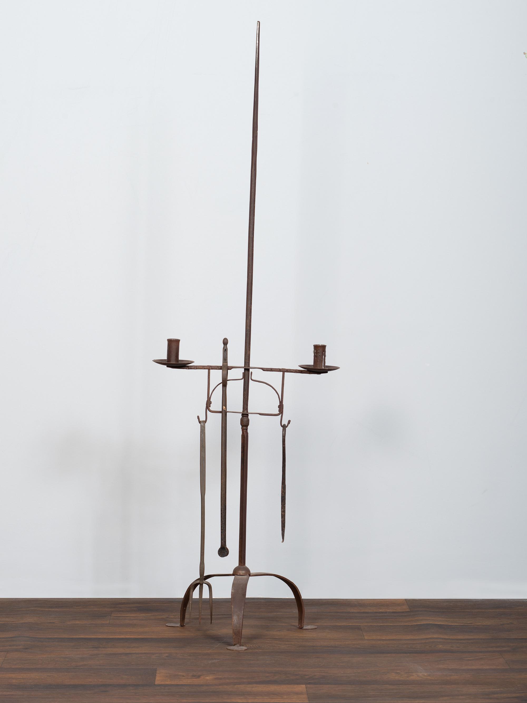 A Set of Wrought and Forged Iron Fireplace Tools on Stand
