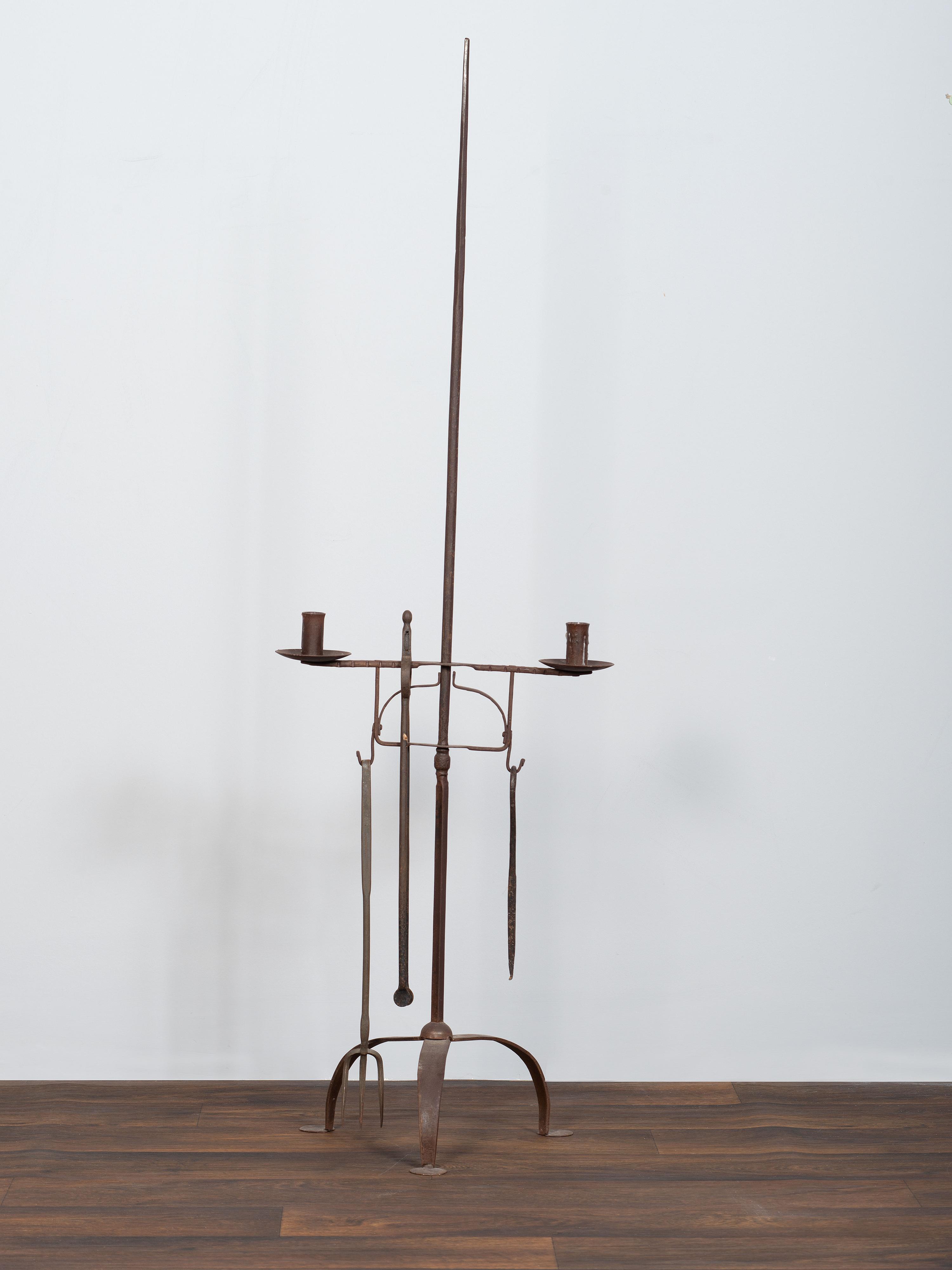 A Set of Wrought and Forged Iron Fireplace Tools on Stand