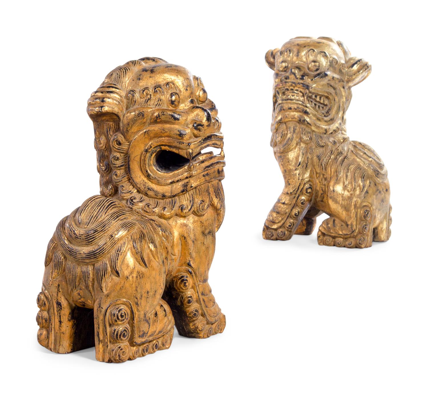 A Pair of Gilt Decorated Lion Figures