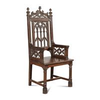 An English Gothic Revival Carved Oak Armchair