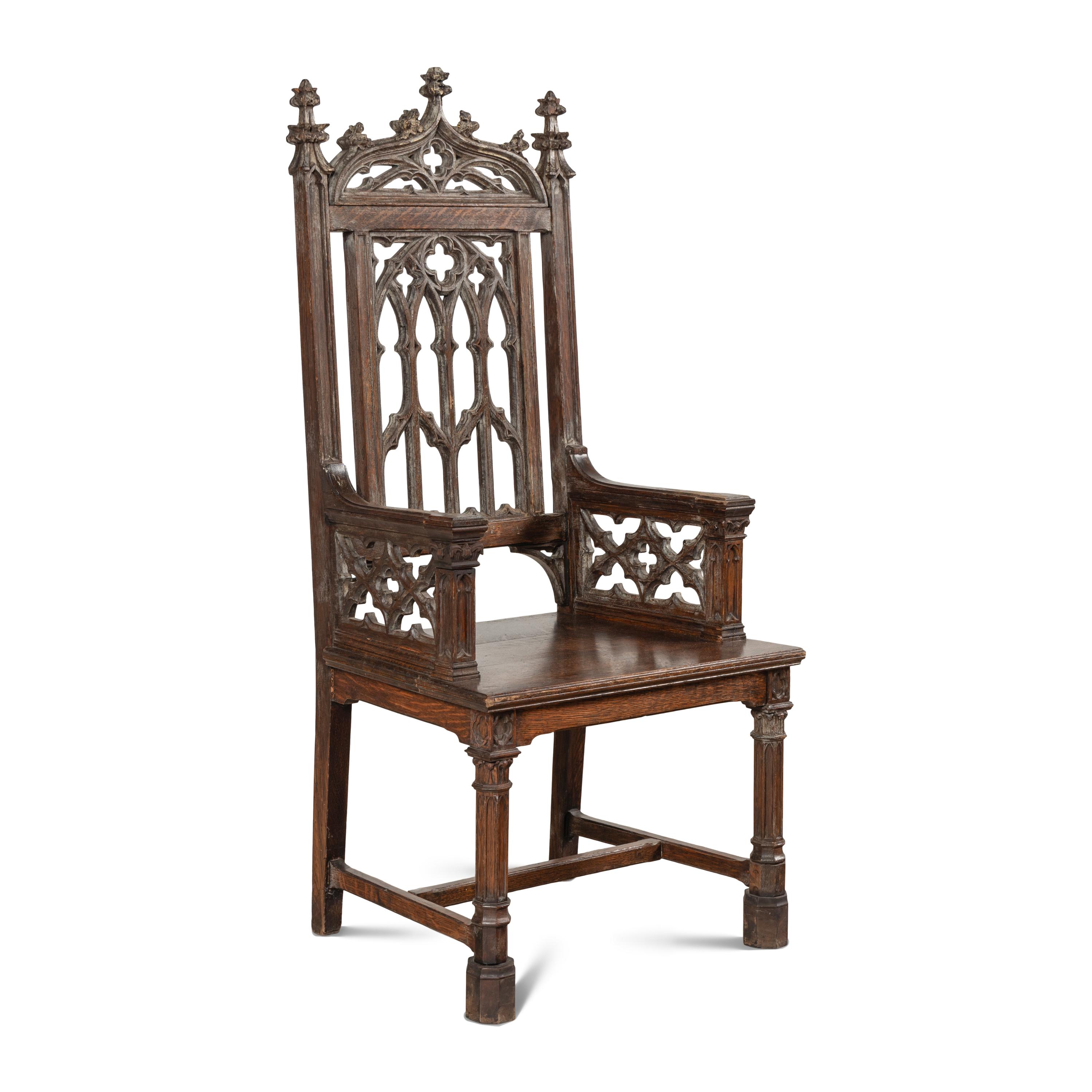 An English Gothic Revival Carved Oak Armchair