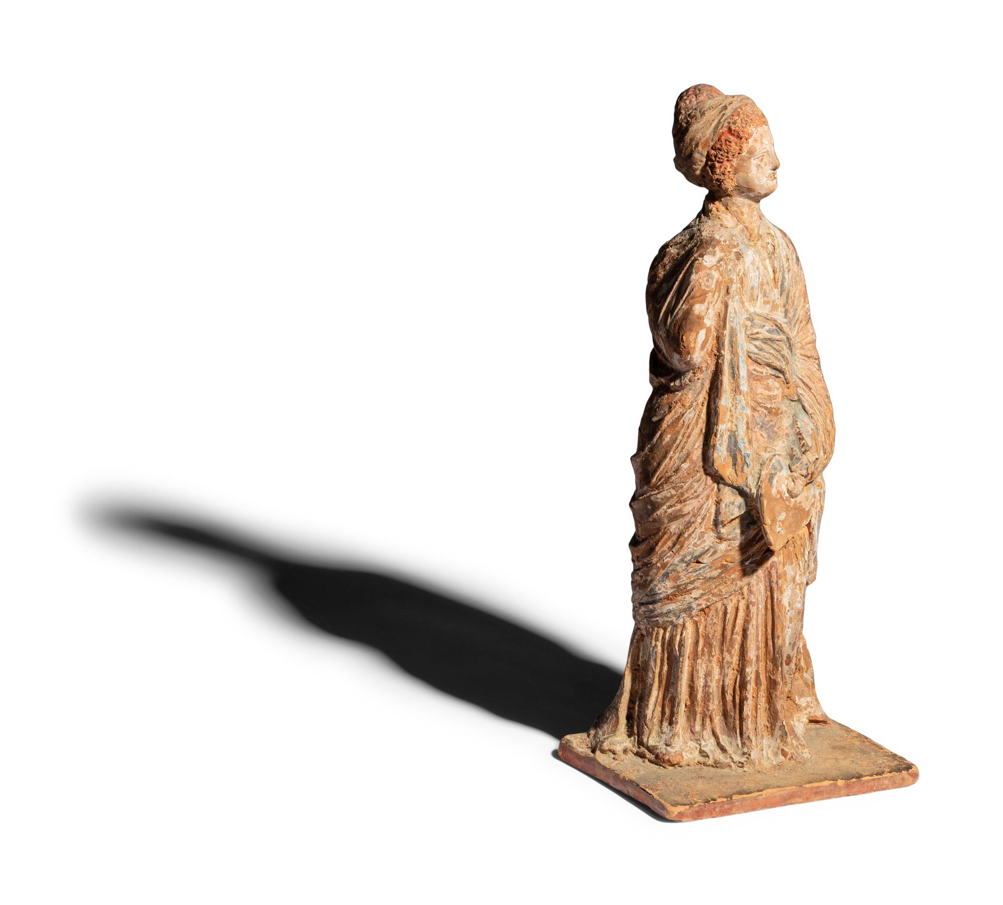 A Neoclassical Terracotta Tanagra Figure