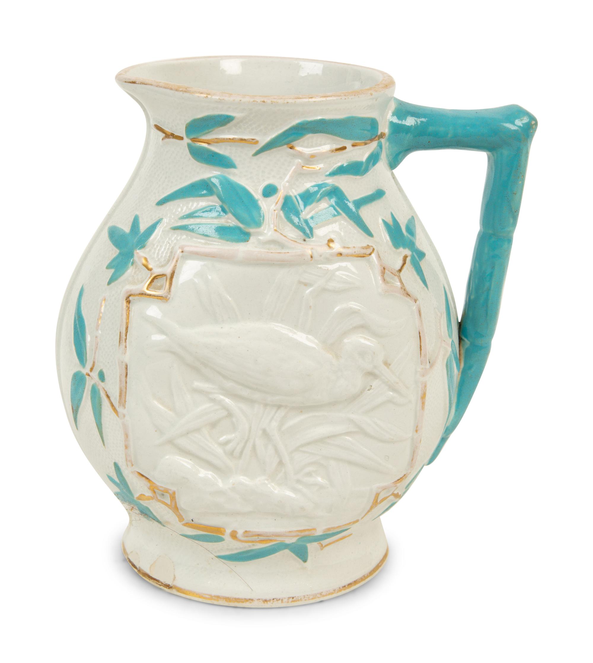 A Collection of Eight English Salt Glazed Relief Form Pitchers and Molded Earthenware — 19TH CENTURY