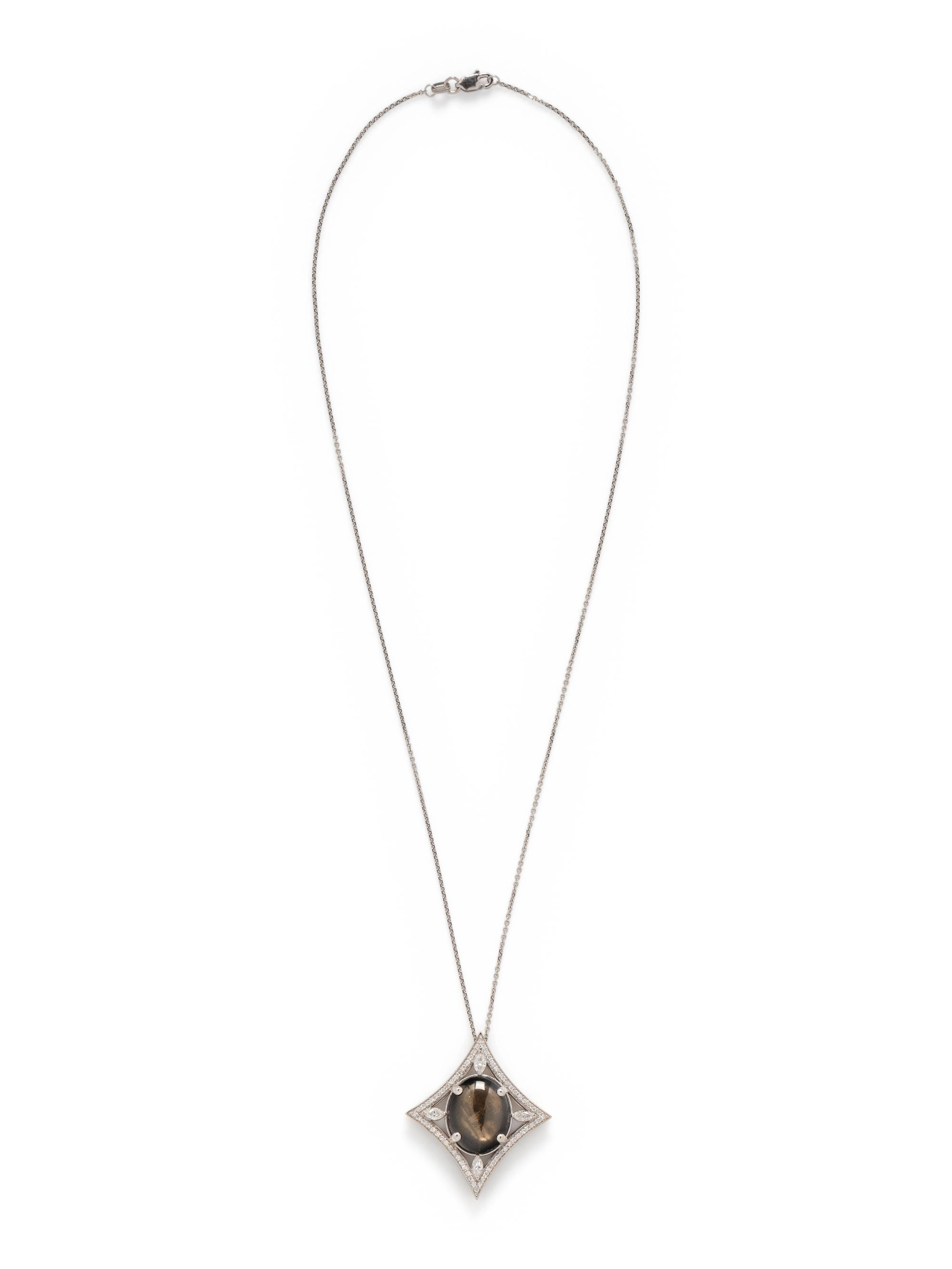 BLACK STAR SAPPHIRE AND DIAMOND PENDANT/NECKLACE