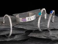 Four Sterling Silver Cuff Bracelets, Three with 14K Gold Accents