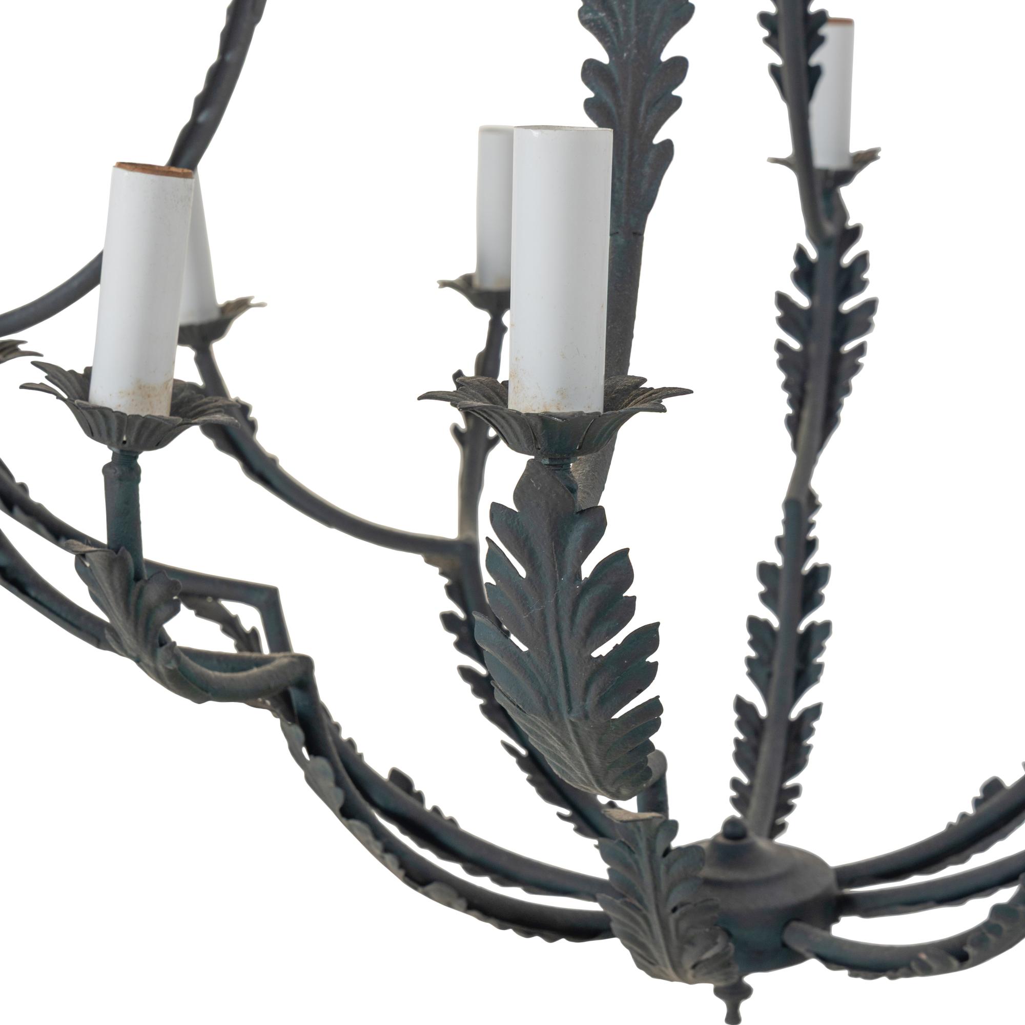 A Pair of Wrought Iron Twelve-Light Leaf-Form Chandeliers
