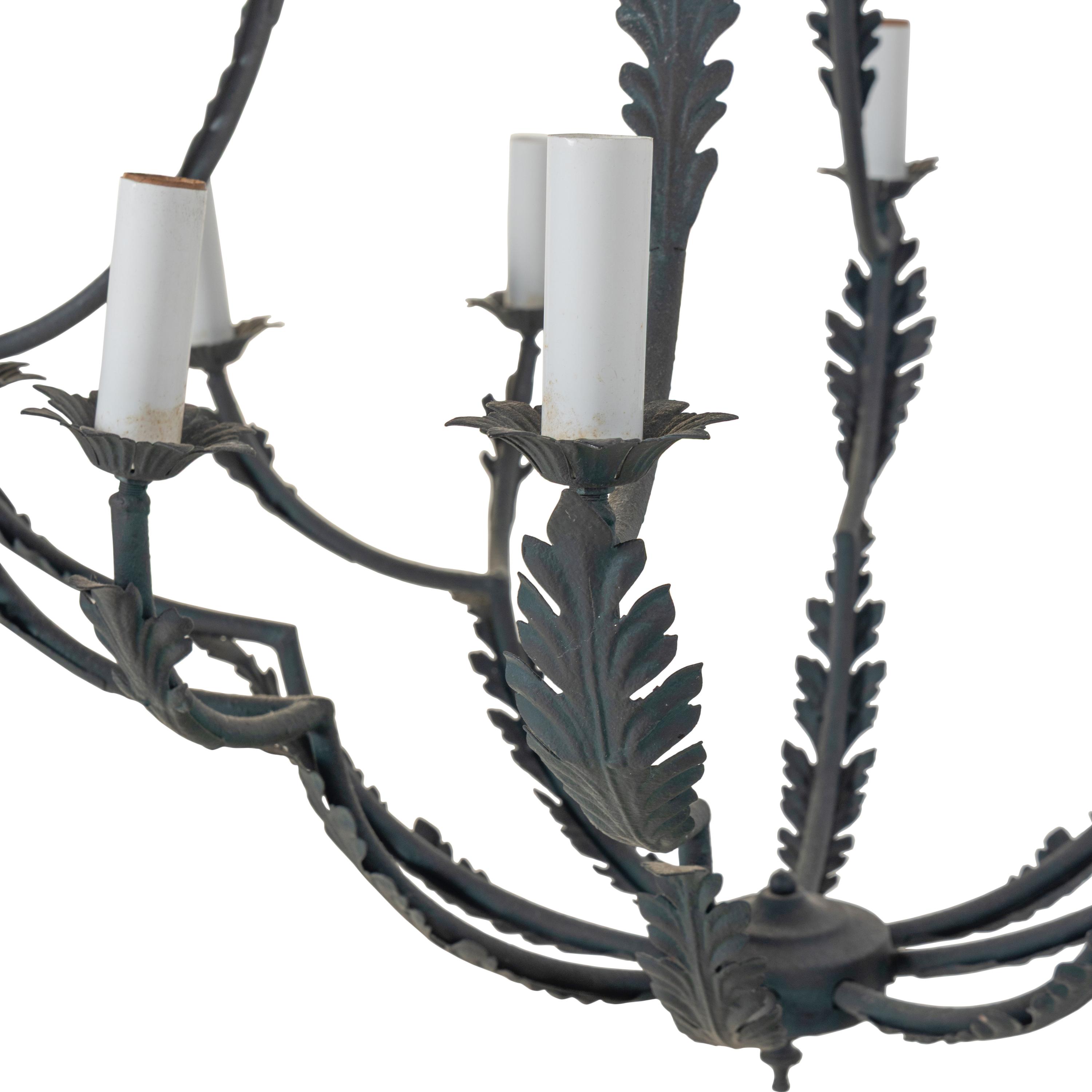 A Pair of Wrought Iron Twelve-Light Leaf-Form Chandeliers