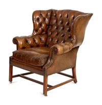 A George III Style Leather Wingback Armchair