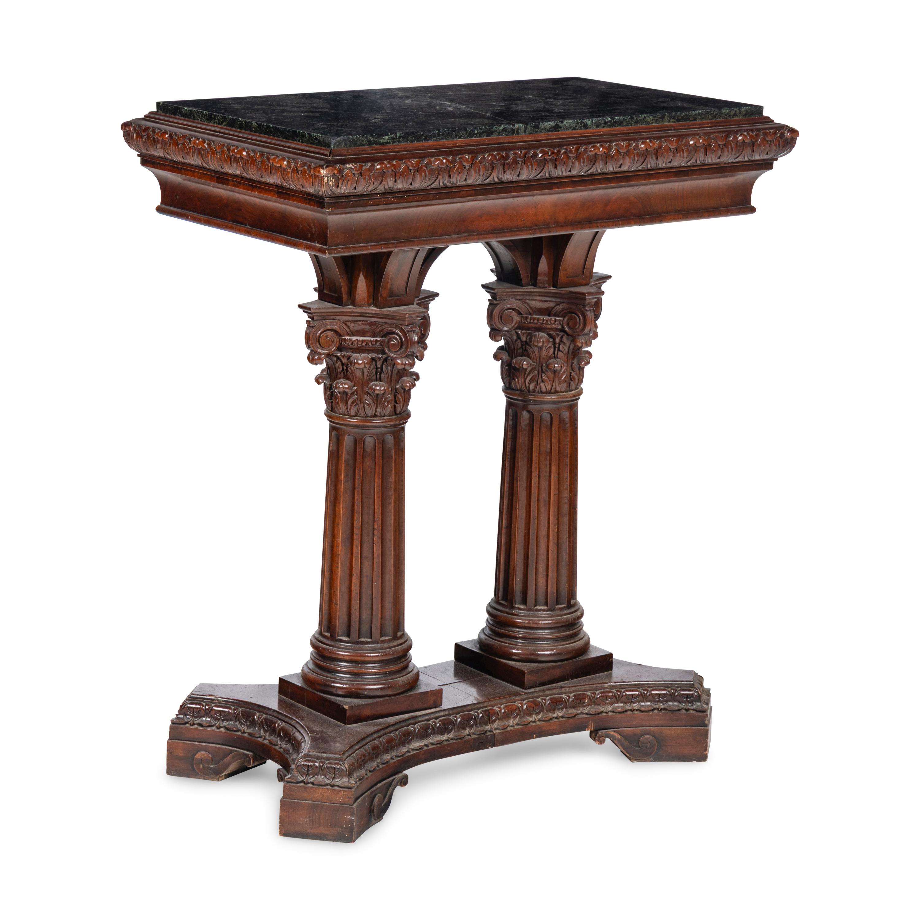 A Renaissance Style Walnut and Marble Pedestal Table