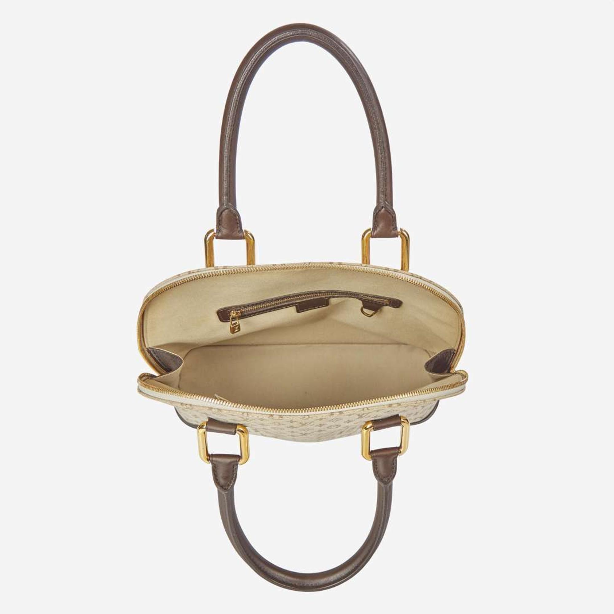 A Louis Vuitton Alma Haut in Khaki Coated Canvas Louis Vuitton