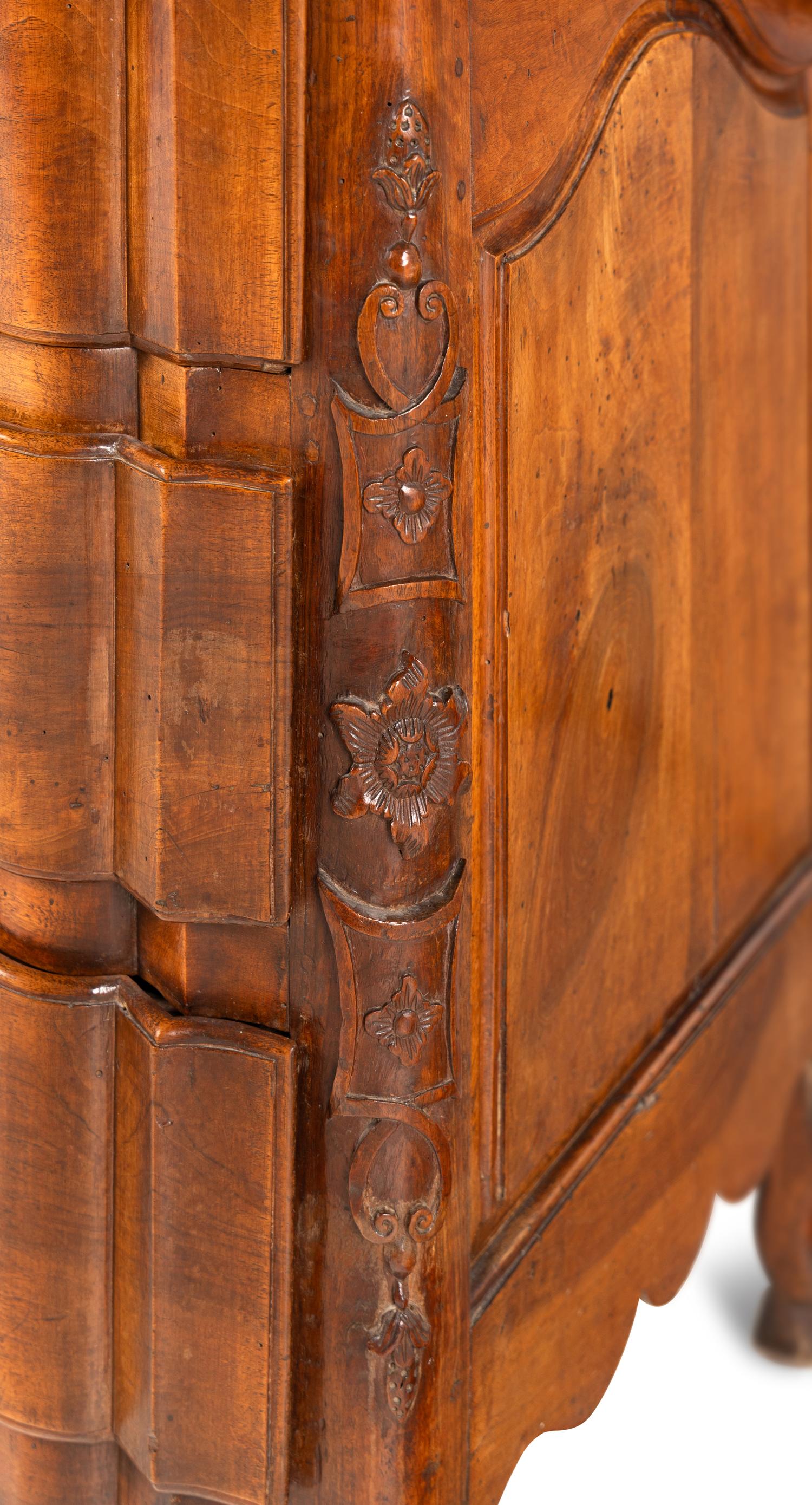 A French Provincial Walnut Commode