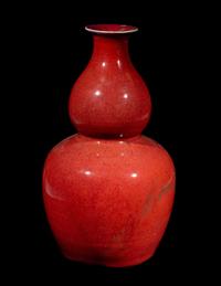 A Chinese Sang-de-Boeuf Glazed Porcelain Gourd-Form Vase