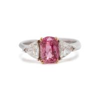 BROWNISH ORANGE-PINK SAPPHIRE AND DIAMOND RING