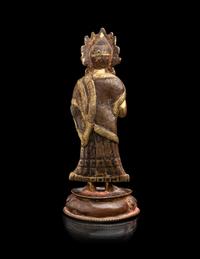 A Nepalese Gilt Bronze Standing Figure of Dipankara