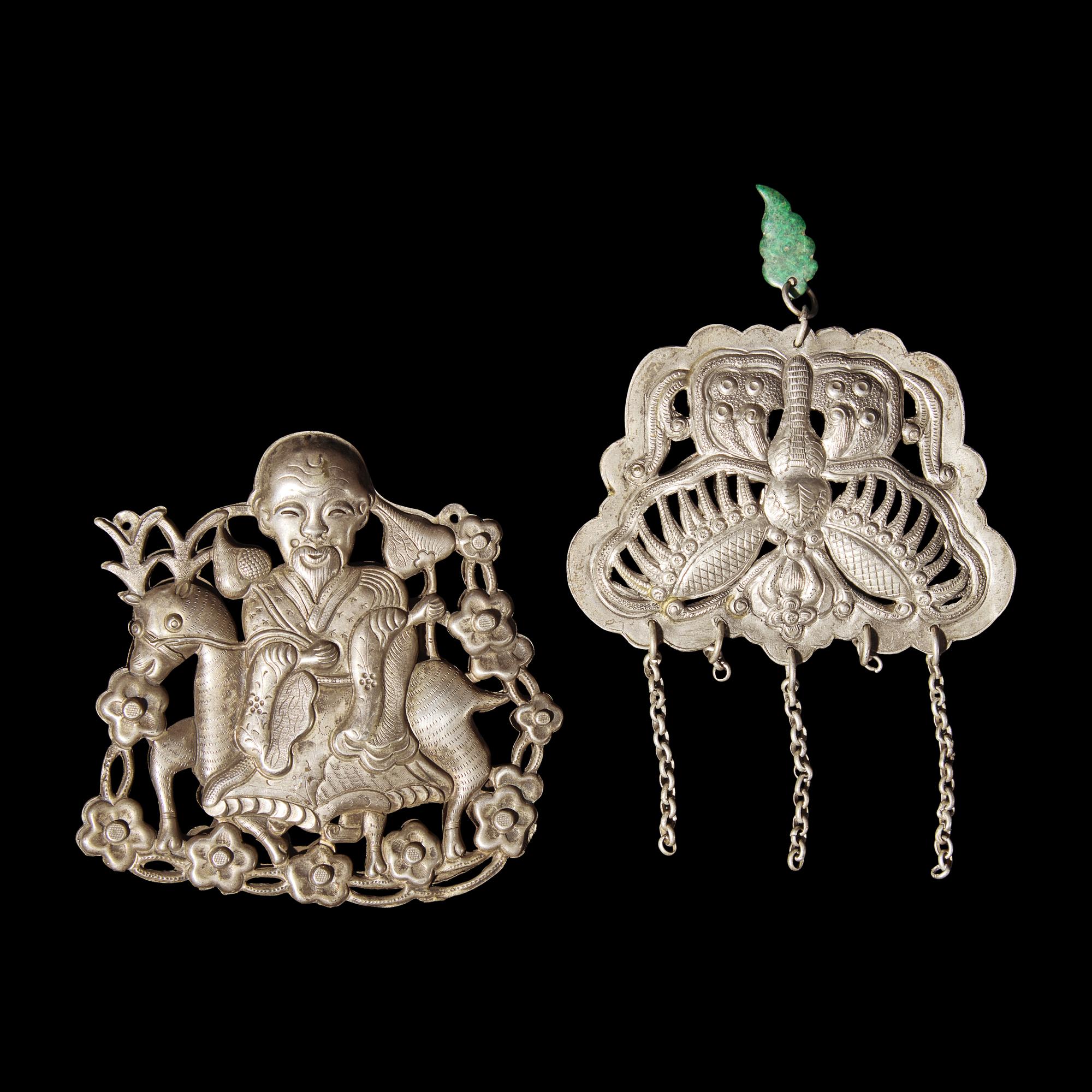 A Group of 10 Assorted Chinese Silver 'Boy and Qilin' Pendants, Late Qing Dynasty-Republic Period 晚清-民國 銀麒麟送子墜瑪瑙長命鎖及其他一組十件