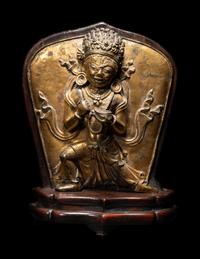 A Tibetan Gilt Bronze Repoussé Vajrapani Panel