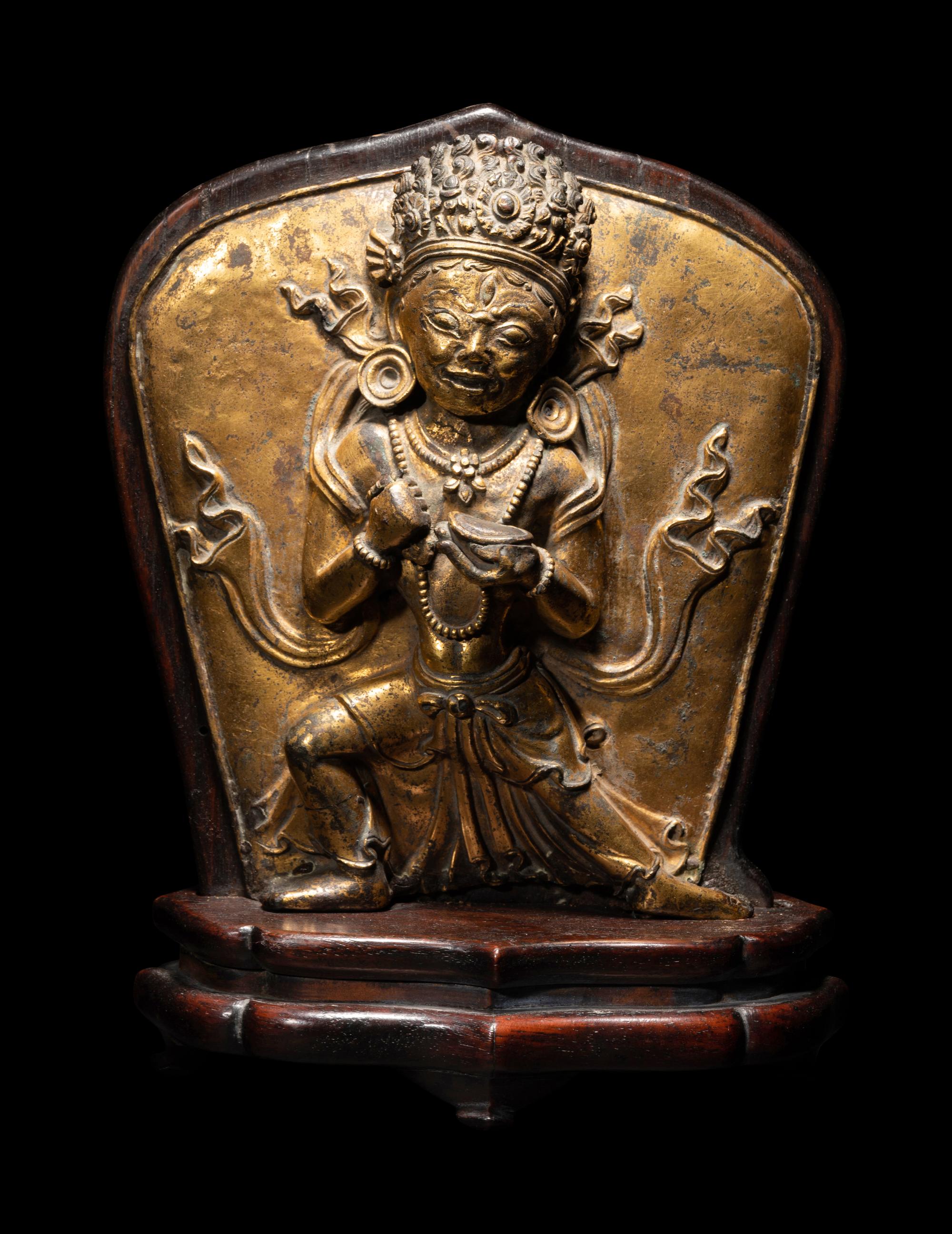 A Tibetan Gilt Bronze Repoussé Vajrapani Panel