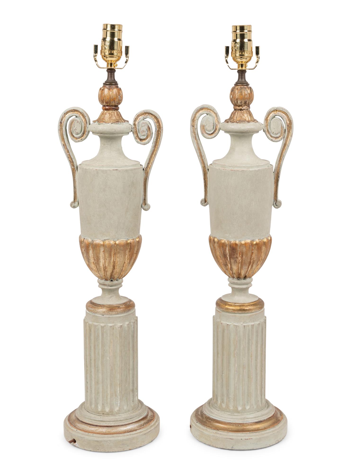 A Pair of Painted and Parcel Gilt Urns on Plinths Mounted as Lamps