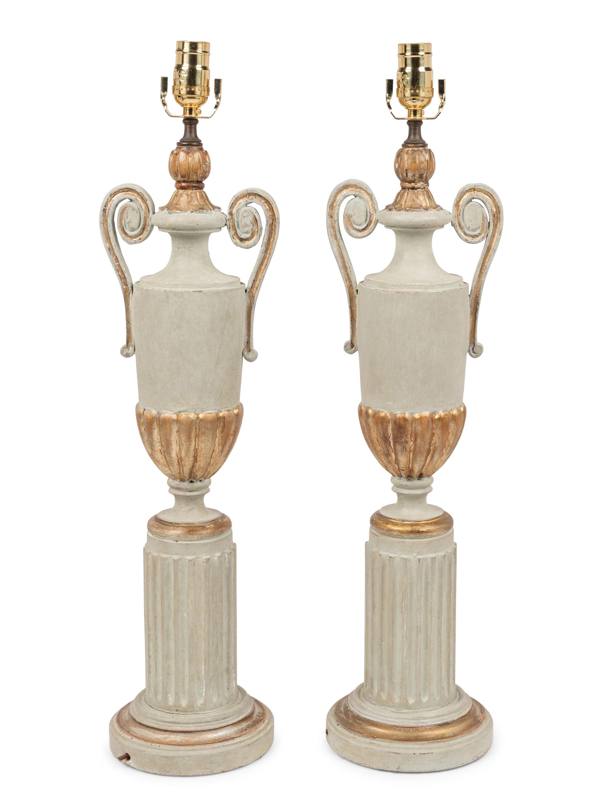A Pair of Painted and Parcel Gilt Urns on Plinths Mounted as Lamps