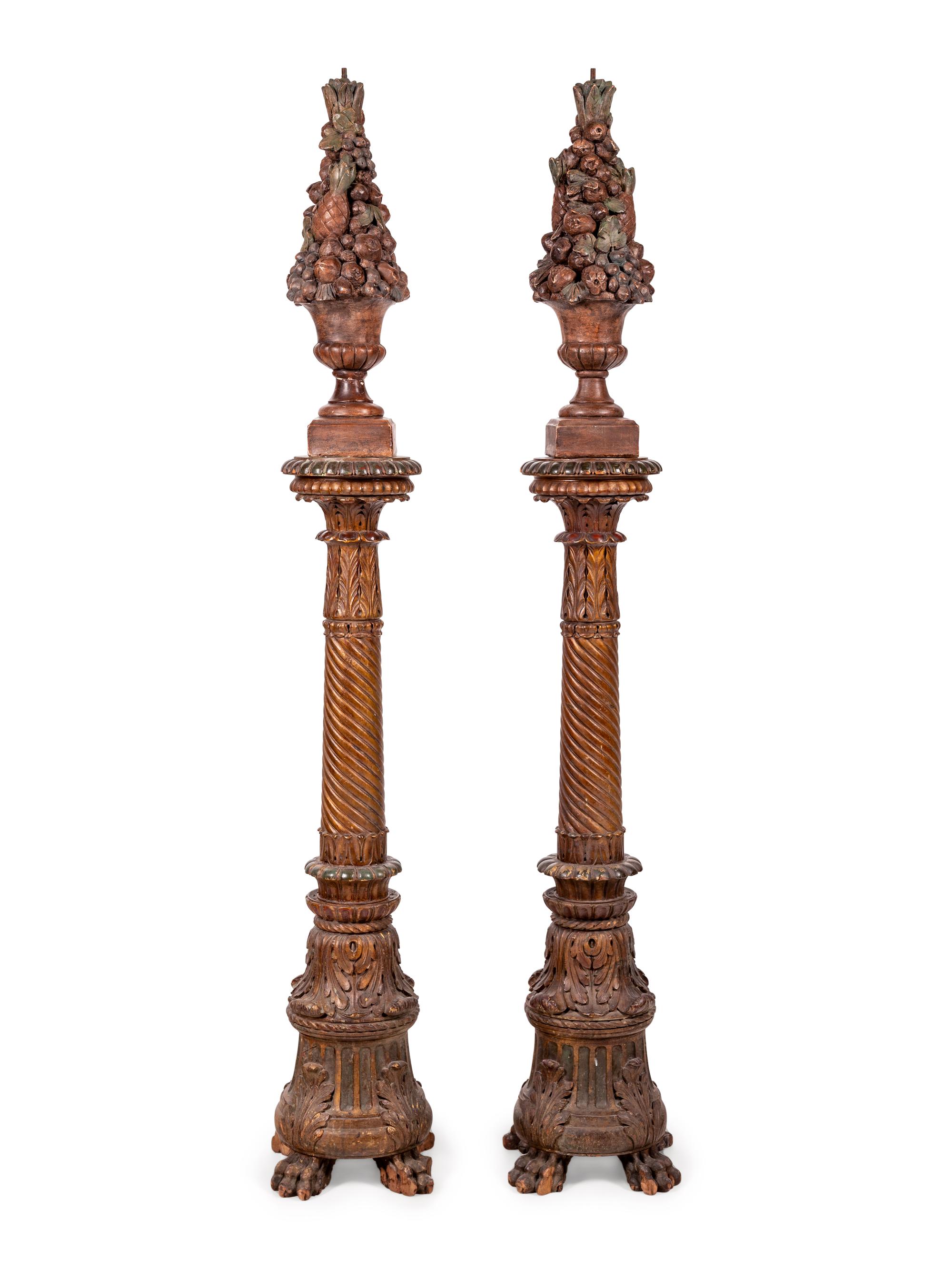 A Pair of Italian Baroque Style Painted Terra Cotta and Carved Wood Pedestals