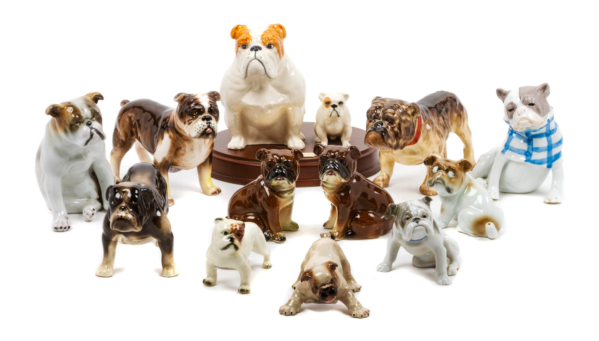 A Group of Twelve Porcelain Bulldogs Width of widest 7 inches.