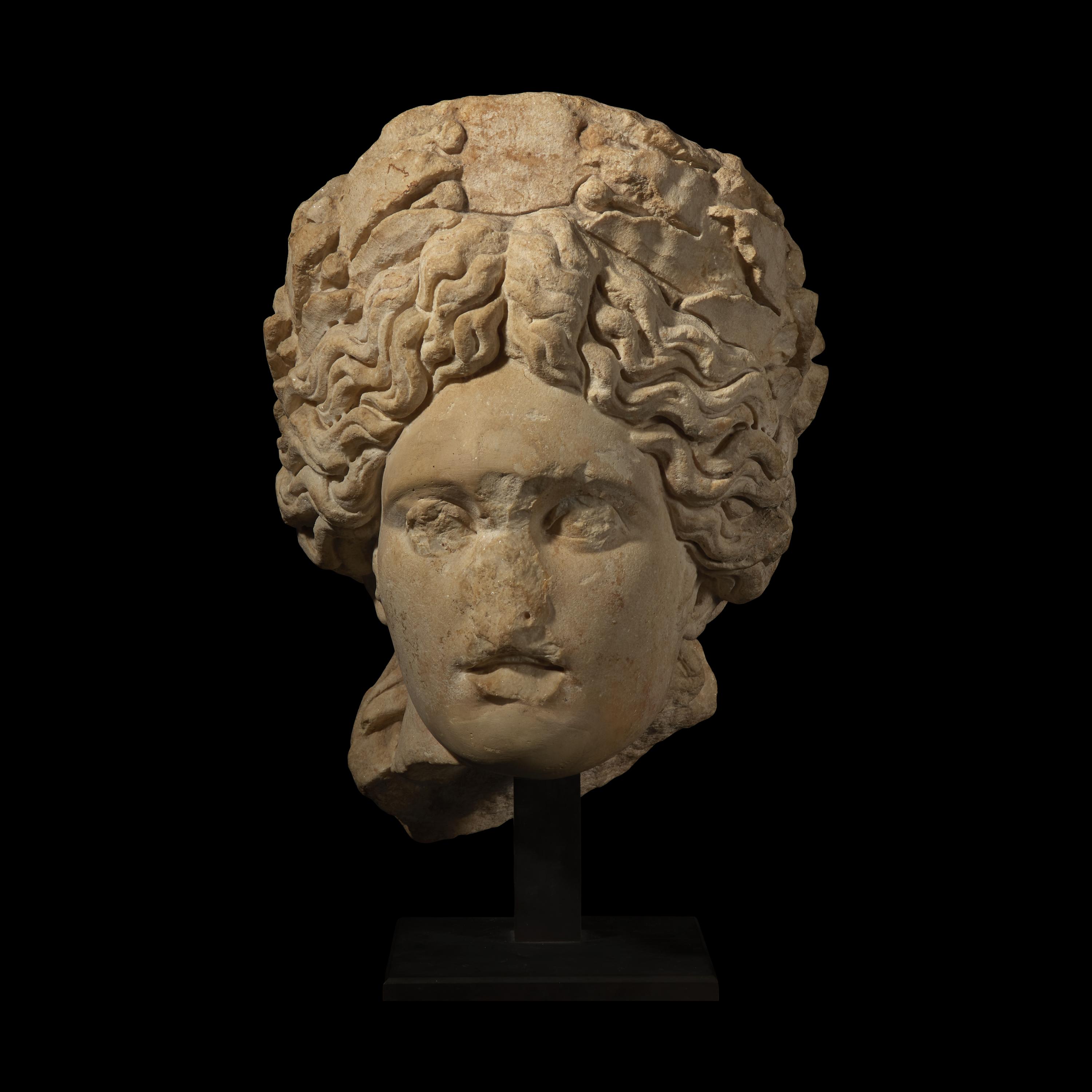 A Roman Marble Head of Apollo Citharoedus