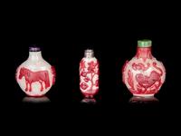 Three Chinese Red Overlay Snow Flake Ground Peking Glass Snuff Bottles