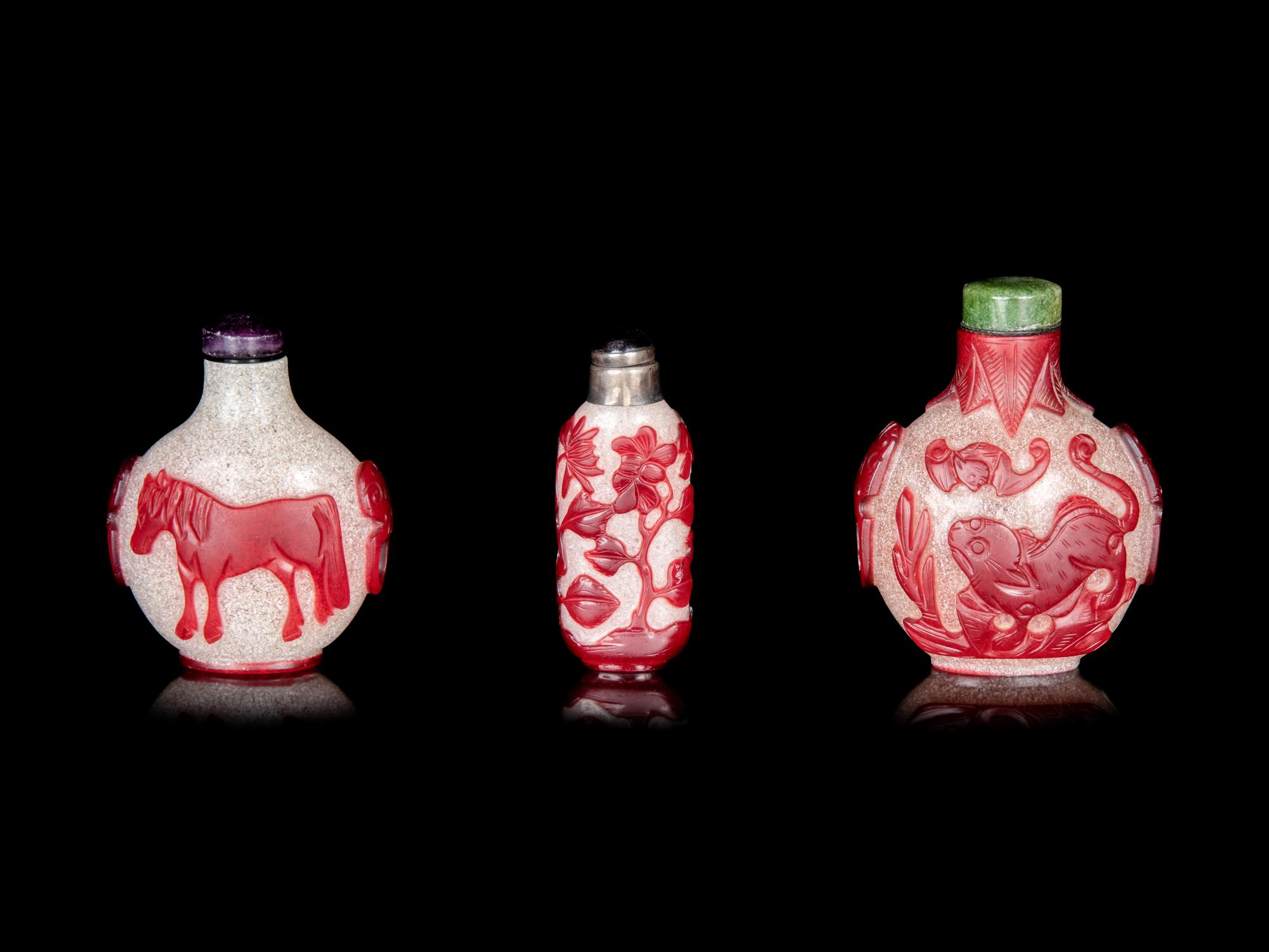 Three Chinese Red Overlay Snow Flake Ground Peking Glass Snuff Bottles