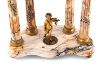 A French Gilt Bronze and Marble Mantel Clock Garniture