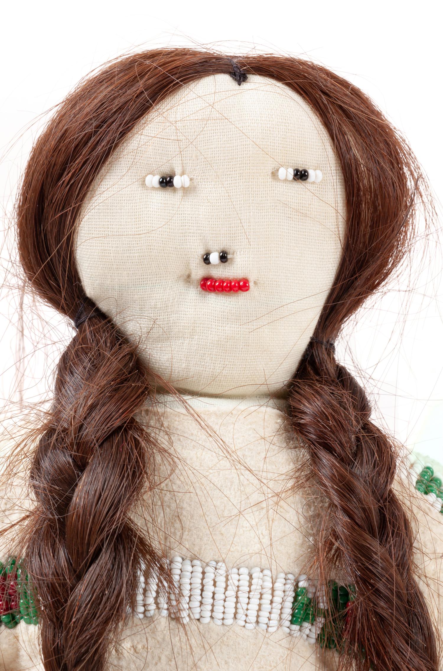Apache and Plains Beaded Hide Dolls