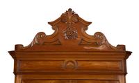 An Italian Figured Walnut Wardrobe Cabinet